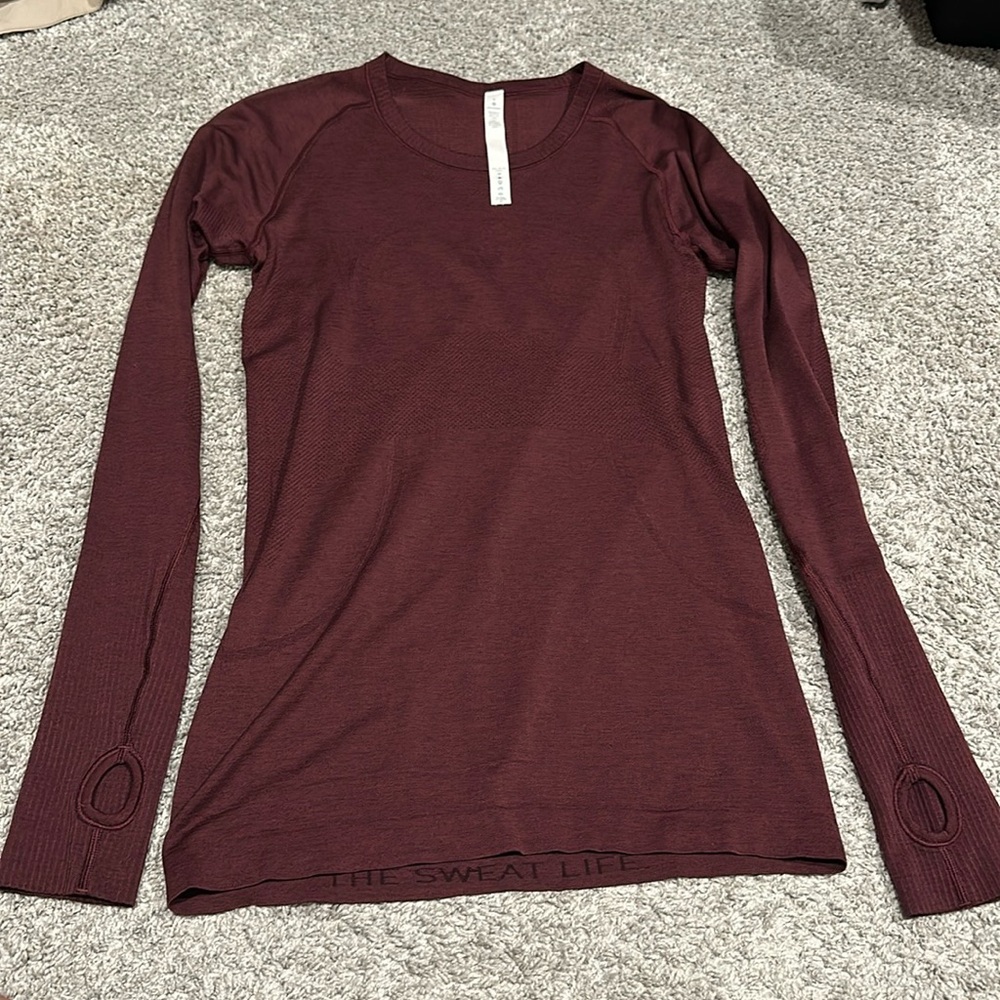 Maroon lululemon swiftly tech long sleeve.